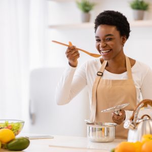 Happy African American Woman Cooking