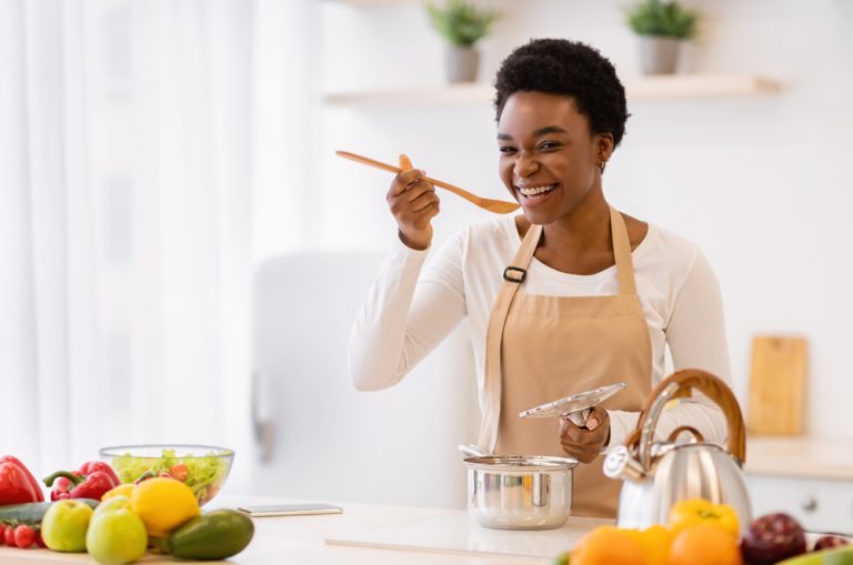 Happy African American Woman Cooking